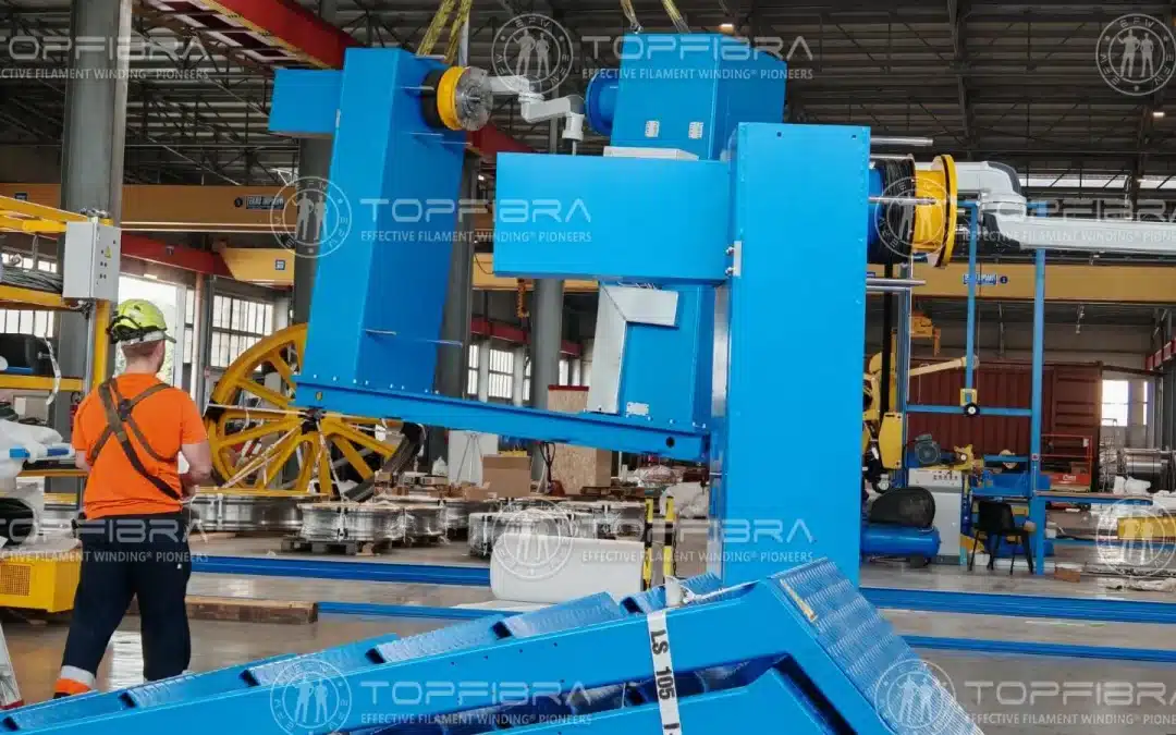 GRP equipment being lifted and loaded on Day 2 at the Topfibra production facility, supervised by the technical team.