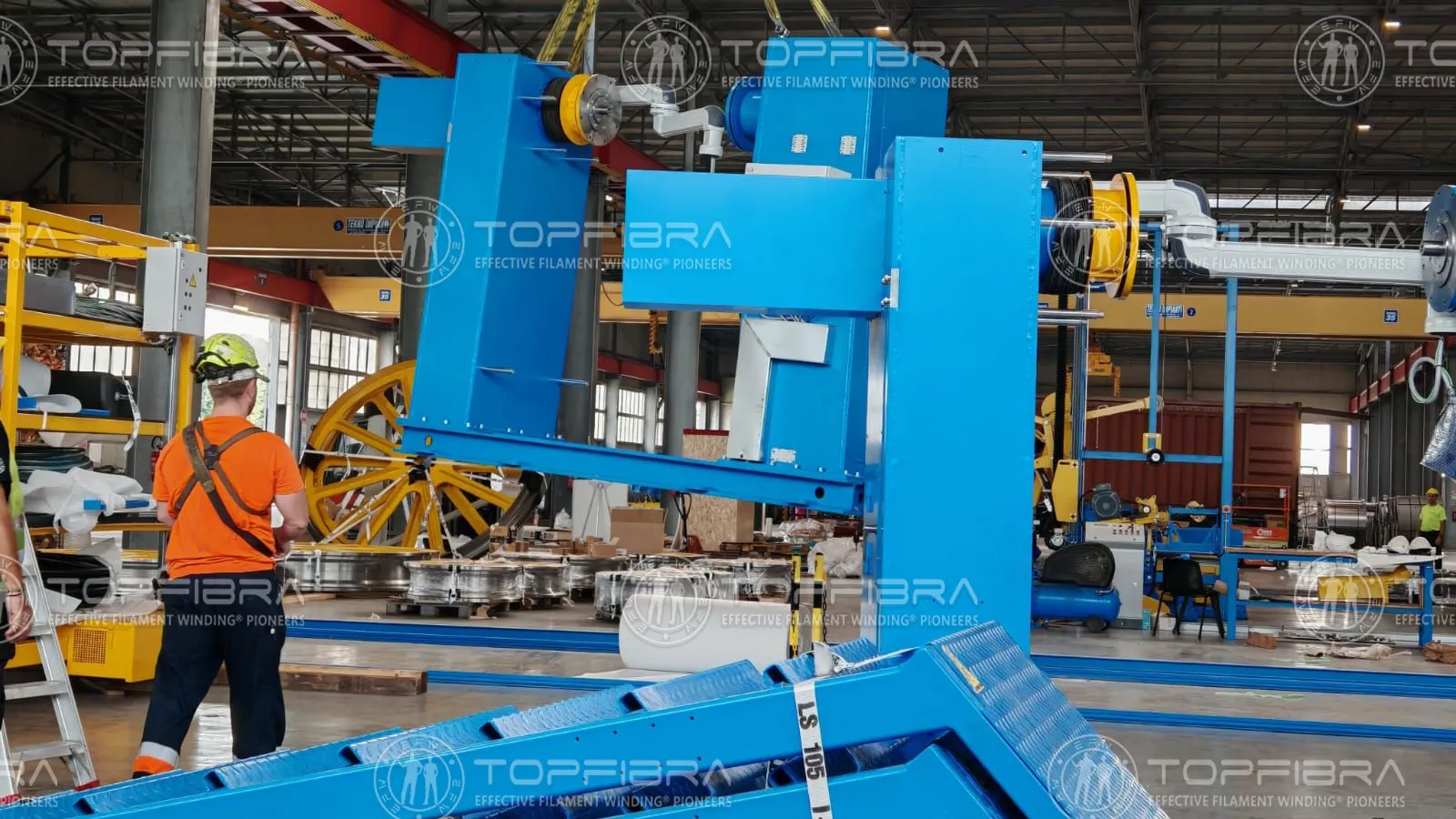 GRP equipment being lifted and loaded on Day 2 at the Topfibra production facility, supervised by the technical team.