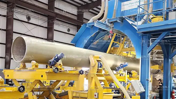 E-CFW winder producing GRP pipe with high precision at partner plant
