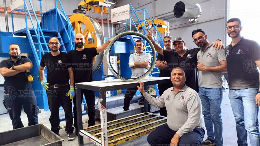 Topfibra team presenting the new generation of GRP couplings built with EFW® Technology