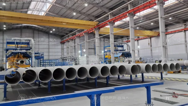 CFW production line using EFW® technology for efficient, high-yield GRP pipe manufacturing. GRP production line with EFW technology